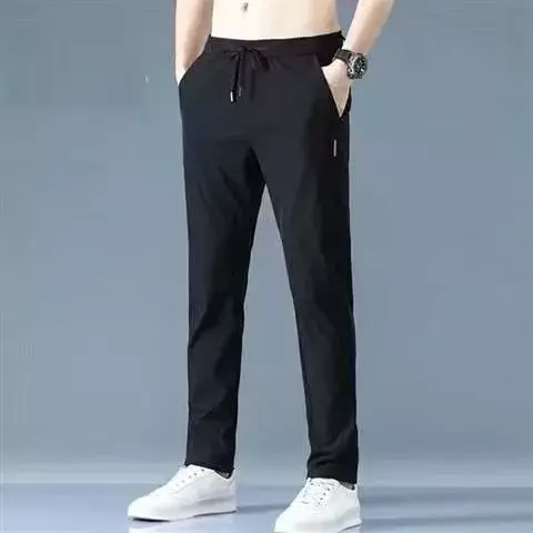 Solidny kolor spodnie męskie spodnie na co dzień spodnie ołówkowe z elastyczną talią oddychające spodnie biegaczy męskie spodnie bojówki Streetwear
