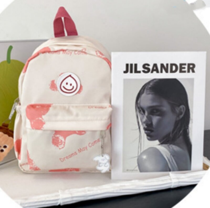 Mochila personalizada para mulheres, mochila personalizada com um sorriso e nome versátil, minimalista, bordado