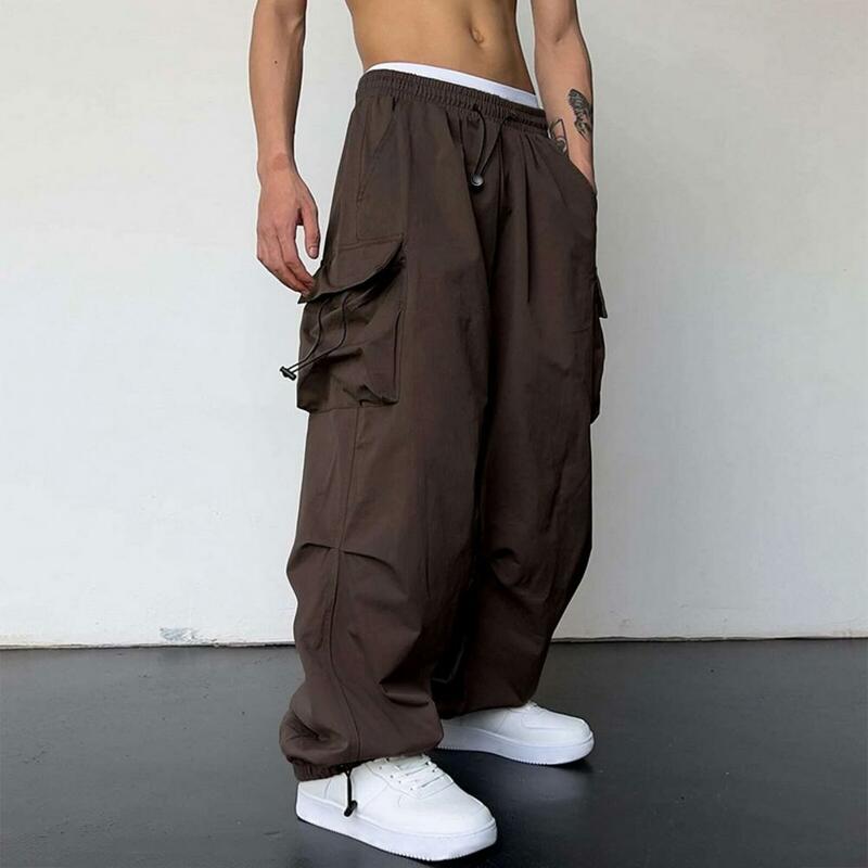 กางเกงคาร์โก้เอวสูงแบบมีกระเป๋าหลายช่องสำหรับผู้ชายทรงโอเวอร์ไซส์สีทึบ