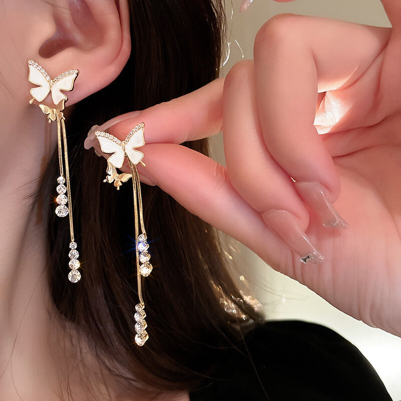 Boucles d'oreilles coréennes à pampilles papillon pour femmes, coquillage en cristal, boucles d'oreilles longues, bijoux de mariage, cadeaux d'anniversaire, tempérament de la mode, nouveau