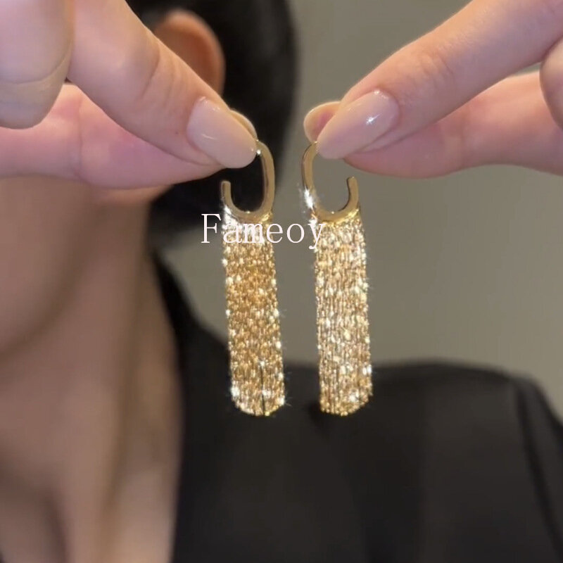 Boucles d'oreilles pompon classiques pour femmes, nouvelle mode, 2024