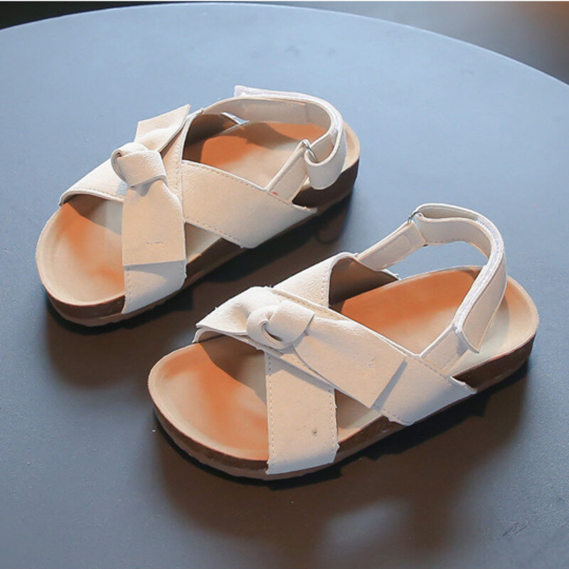 Sandalias de piel sintética con lazo para niña, zapatos planos de suela suave, de corcho, a la moda, para playa, Verano