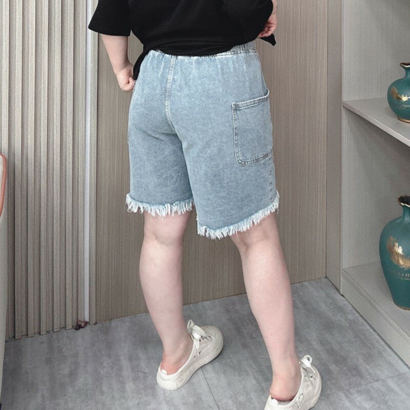กางเกงยีนส์ยาวถึงเข่าเอวยืดได้ของผู้หญิงกางเกงขาสั้นขากว้างมีพู่ทรงหลวมไซส์ใหญ่พิเศษ2024ฤดูร้อน