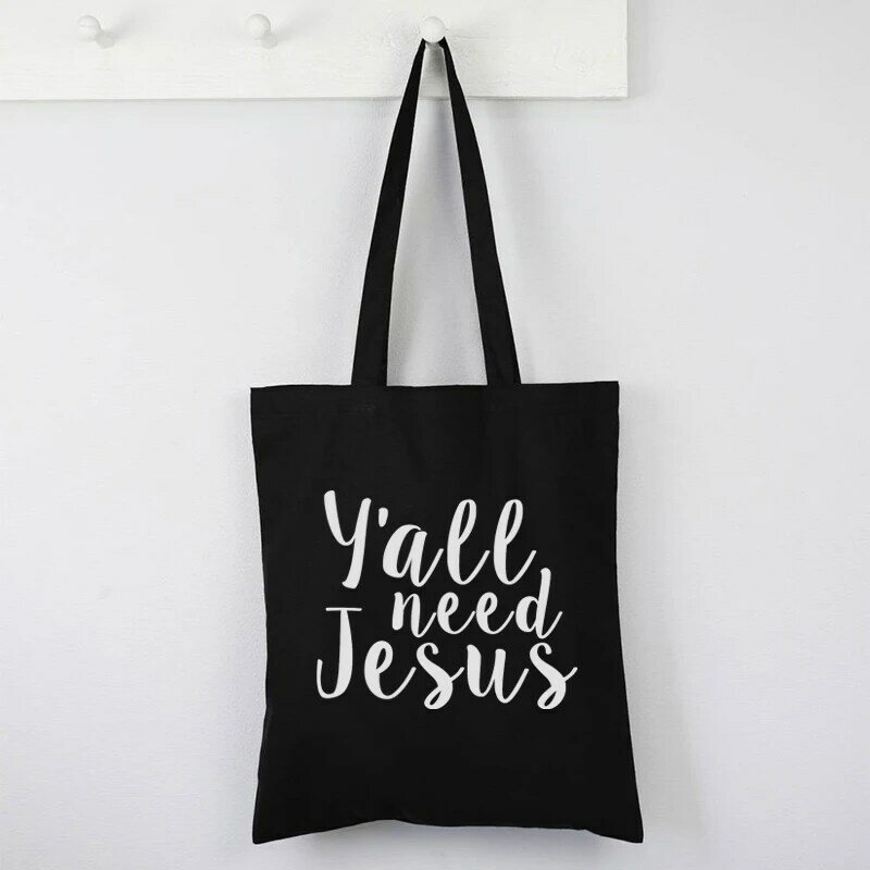 Y'all Need Jesus กระเป๋าคริสเตียนช้อปปิ้งกระเป๋าศาสนากระเป๋าแฟชั่นพระเยซูพิมพ์ถุงช้อปปิ้งนำกลับมาใช้ใหม่