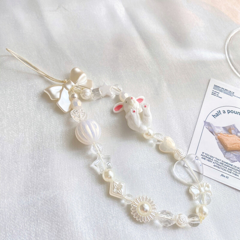 Nova moda charme branco coelho estrela arco corrente do telefone móvel decoração anti-perdido cordão pingente acessórios femininos jóias 2023