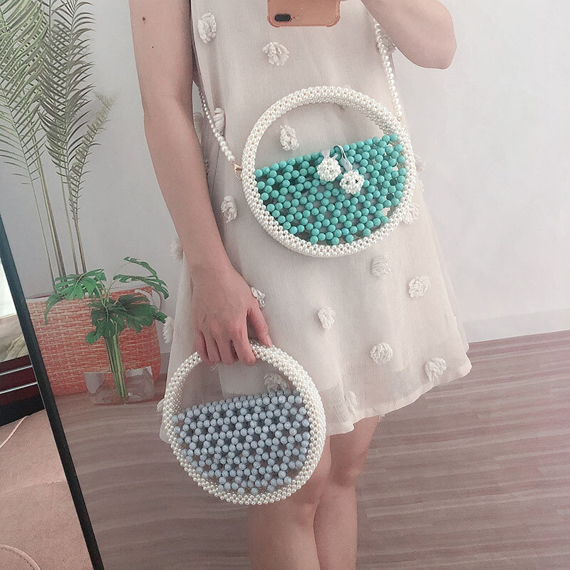 2022 férias de verão novo coreano tecido artesanal frisado pequena embreagem oco para fora pérolas redondas bolsa feminina chique praia saco