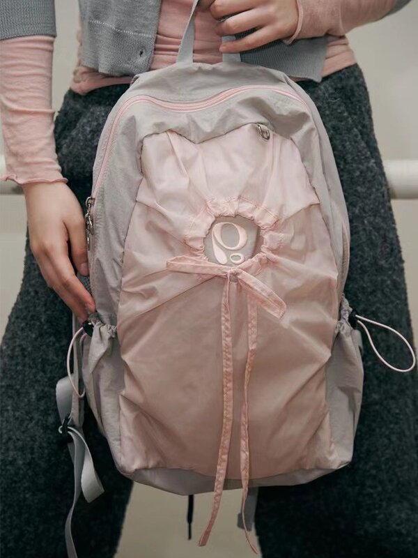 Zaino da viaggio per il tempo libero dello studente della borsa dello zainetto Casual dello zaino di modo di personalità del ricamo rosa coreano