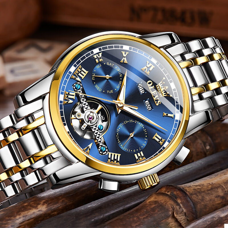 OLEVS นาฬิกาข้อมือผู้ชายอัตโนมัตินาฬิกาข้อมือธุรกิจกันน้ำสแตนเลสสตีลนาฬิกาผู้ชาย Skeleton ปฏิทิน