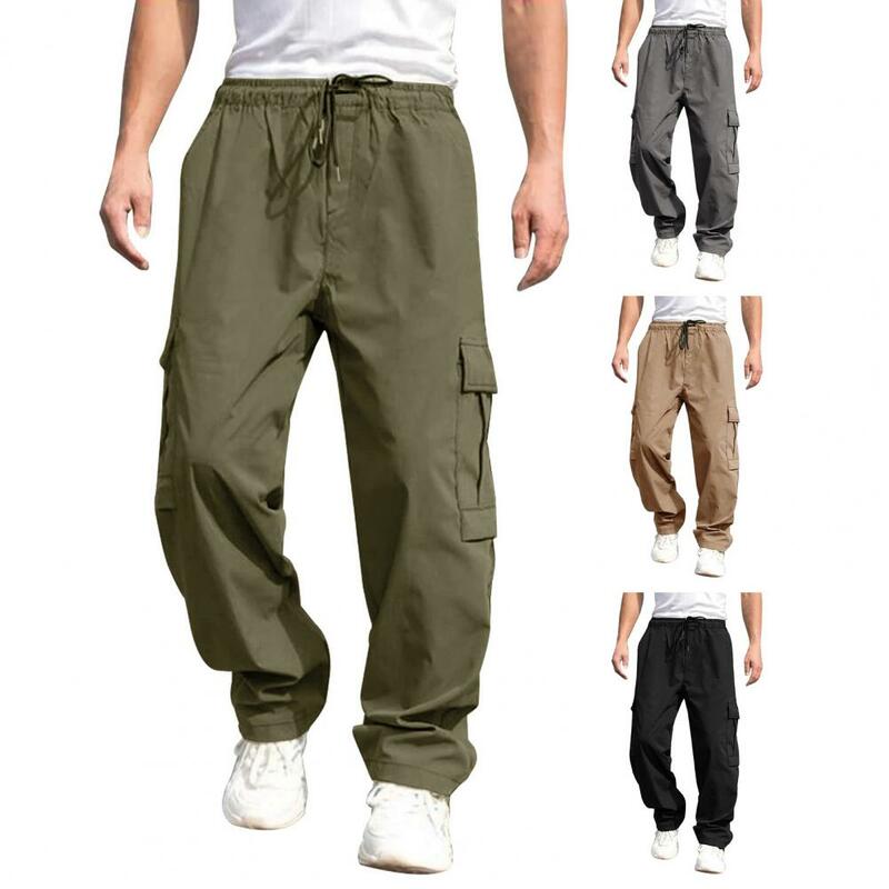 Calça de perna larga masculina com cintura com cordão, bolsos múltiplos, calça solta, estilo casual de streetwear