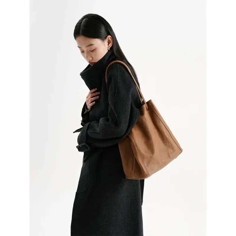 Bolsa de ombro versátil feminina, design de nicho, bolsa de balde requintada de alta qualidade, estilo ocidental, tendência da moda, nova, 2024