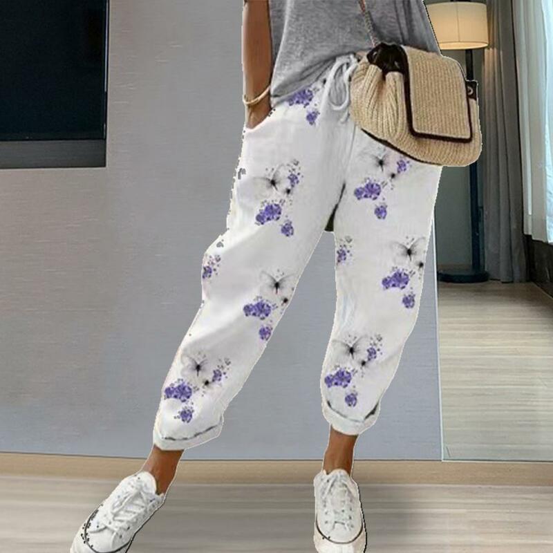 กางเกงหลวมลายดอกไม้มีกระเป๋าเอวยางยืดกางเกงย้อนยุคทรงหลวมสำหรับผู้หญิงกางเกงสตรีทแวร์
