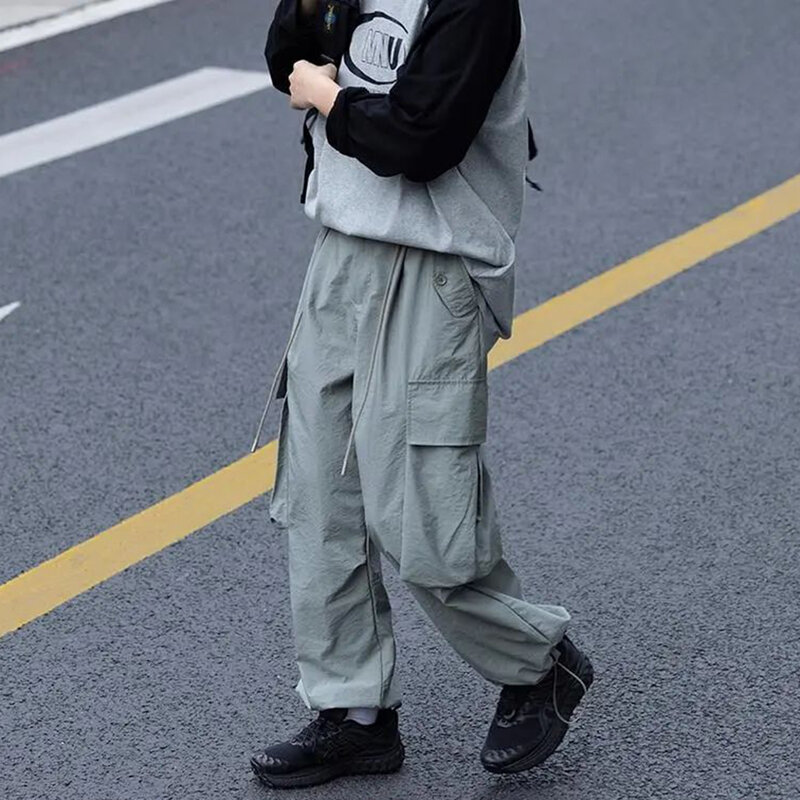 Celana kargo ukuran besar untuk pria, celana kargo lurus longgar bergaya Jepang bersaku untuk pria