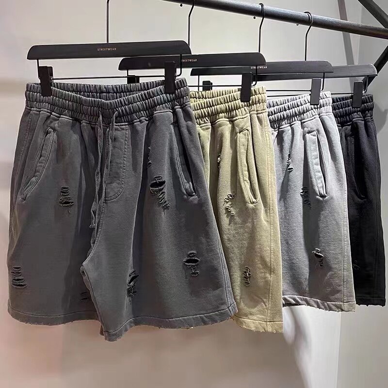 Worn-out baggy shorts, cut-up pantaloncini vintage