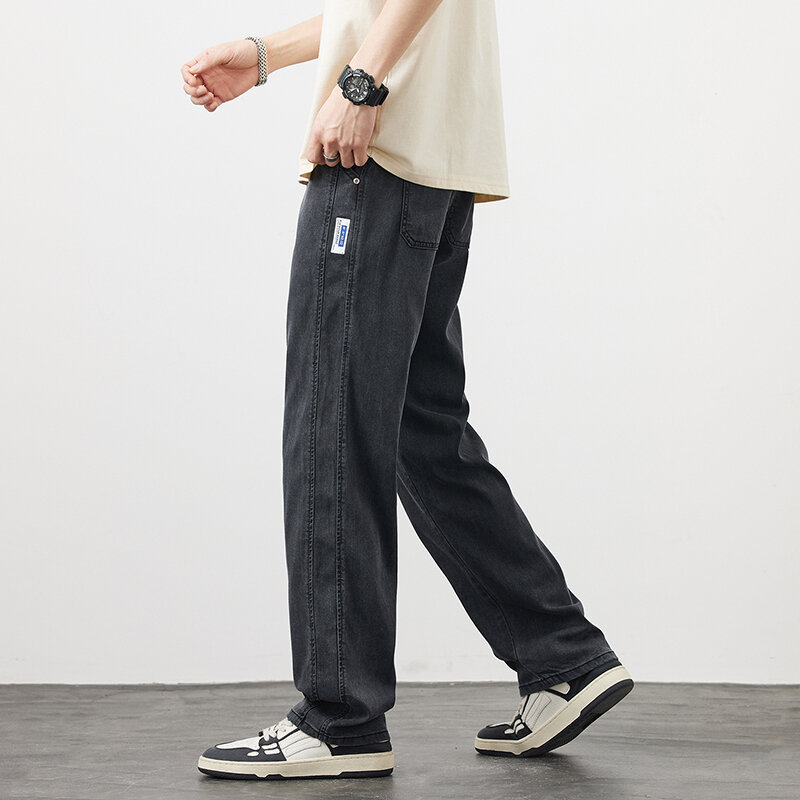 Letnie nowe męskie Ultra-cienkie luźne proste dżinsy wygodne spodnie Lyocell koreańska moda Retro niebieski i czarny spodnie dżinsowe