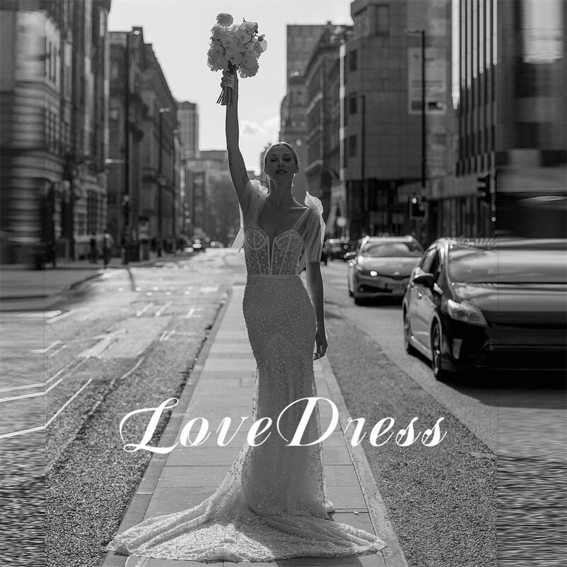 Lovedress ชุดนางเงือกมีกากเพชรสำหรับงานแต่งงานชุดกระโปรงเจ้าสาวสายสปาเก็ตตี้แวววาว