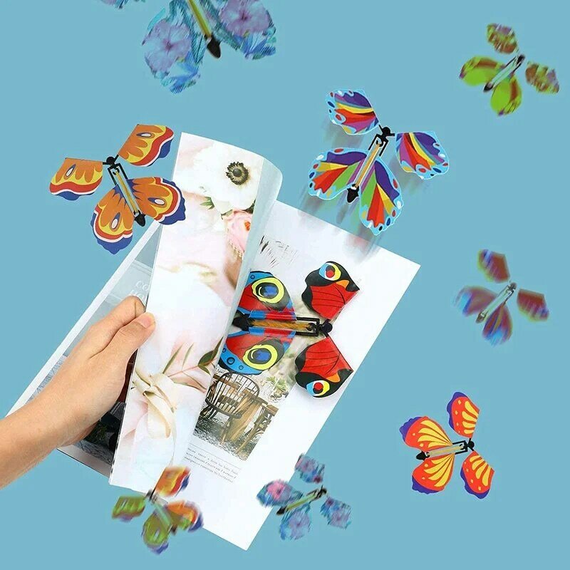 Magia Wind Up Flying Butterfly no Livro, Elástico, Powered Magic Fairy Toy, Grande Surpris Presente, Favor de Festa, 1-10Pcs