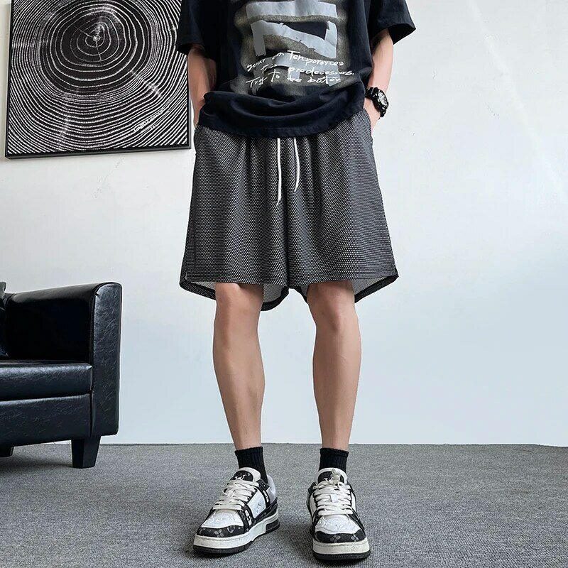 Celana pendek Fashion Korea pria, celana pantai bernapas kasual nyaman longgar Musim Panas 2024