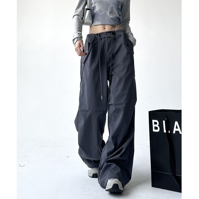 Funkcjonalne spodnie Cargo za duże kieszenie w stylu amerykańskim modne szerokie nogawki wzornictwo High-street koreańskie luźna odzież uliczna damskie