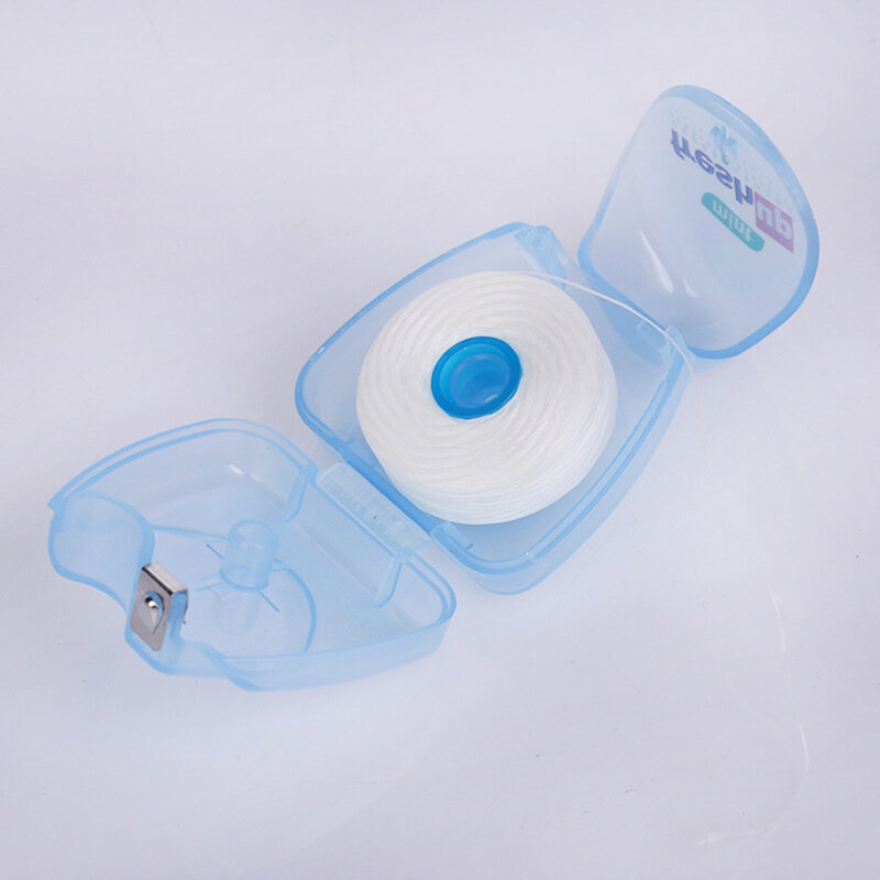 Microcera Dental portátil de 50M, cepillo Interdental, palillos de dientes, hilo Dental, higiene bucal, alambre de limpieza, venta al por mayor, 1 unidad