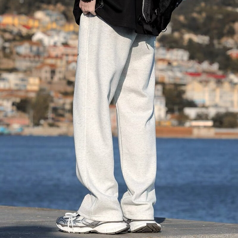 Pantaloni Casual tinta unita uomo autunno e inverno 2024 nuovi pantaloni della tuta larghi pantaloni americani a vita alta a vita alta a vita alta maschili