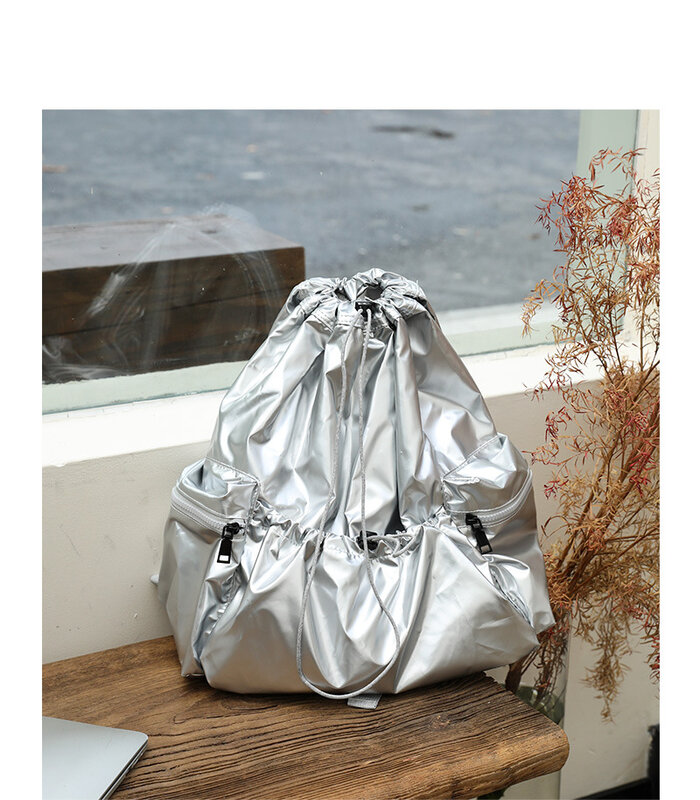silvery waterproof backpack for Men and women,Lightweight traveling bag, 2024 popular school pleated string backpack