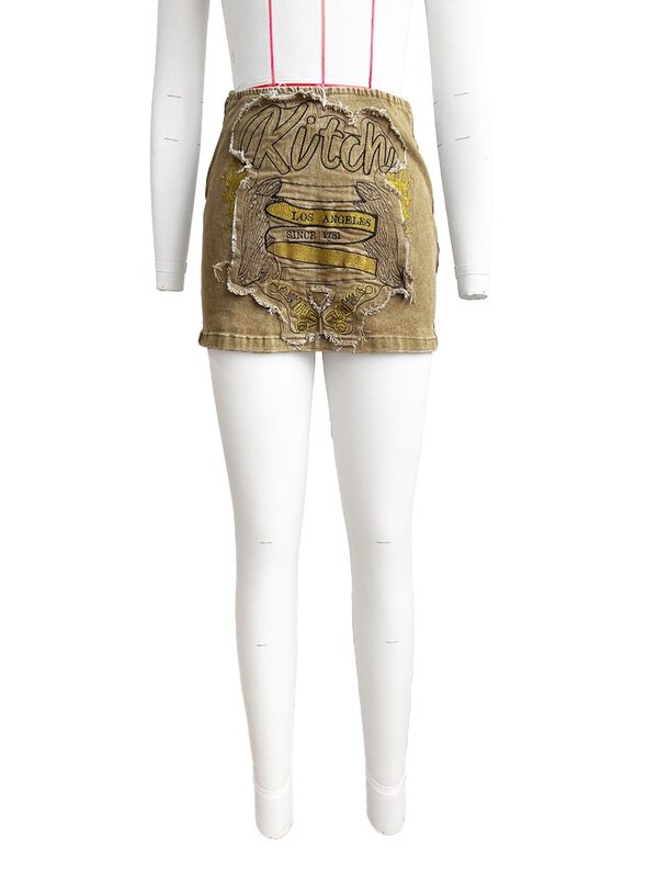 Mini jupe en denim avec pompon brodé pour femme, taille élastique, fermeture éclair, jeans hipster, jupon, mode streetwear