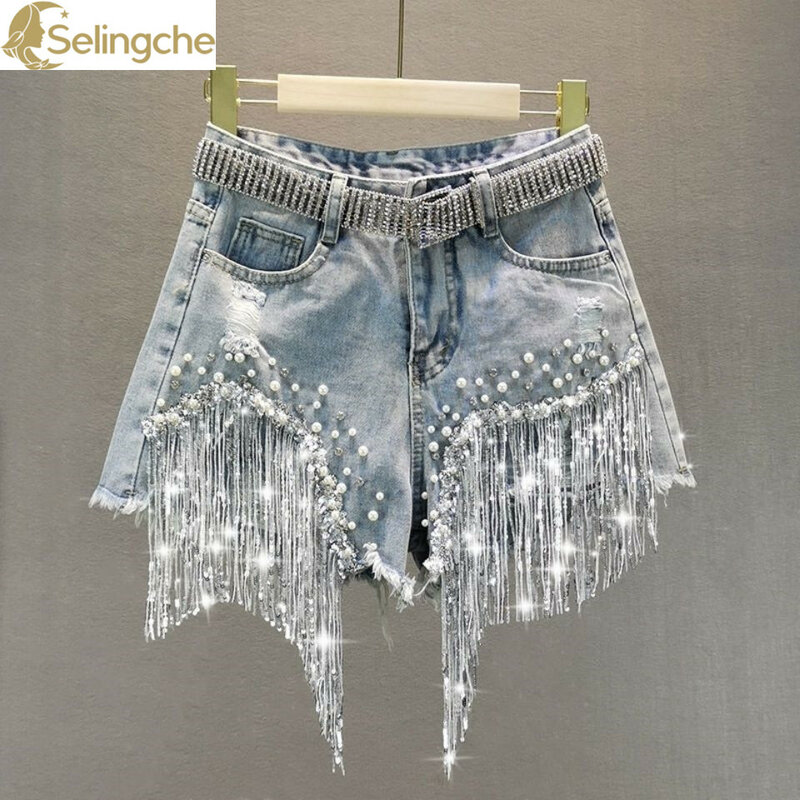Spodenki jeansowe damskie letnie i koreańskie wersje z wysokim stanem i smukłe z dziurkami wysadzanymi cekinami frędzle spodnie z szerokimi nogawkami