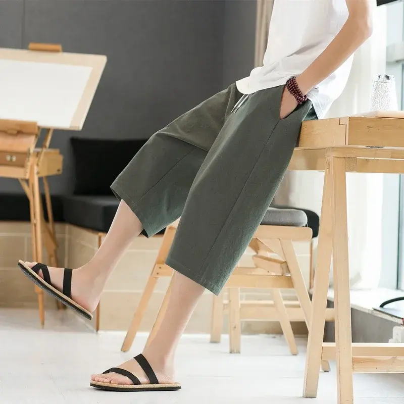 Celana panjang serbaguna pria, celana Kapri tren Korea longgar Linen katun musim panas longgar dan nyaman