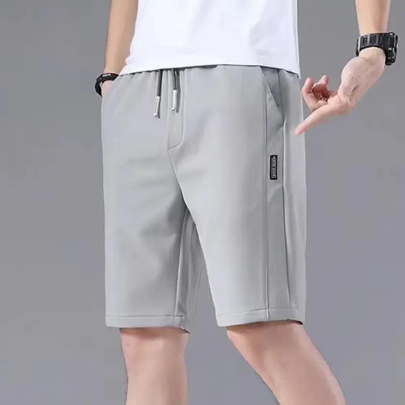 Men's Sports Shorts Solid Color Straight Pattern Loose Type Summer Elastic Waist Drawstring Casual Shorts Jogging Pants for Male