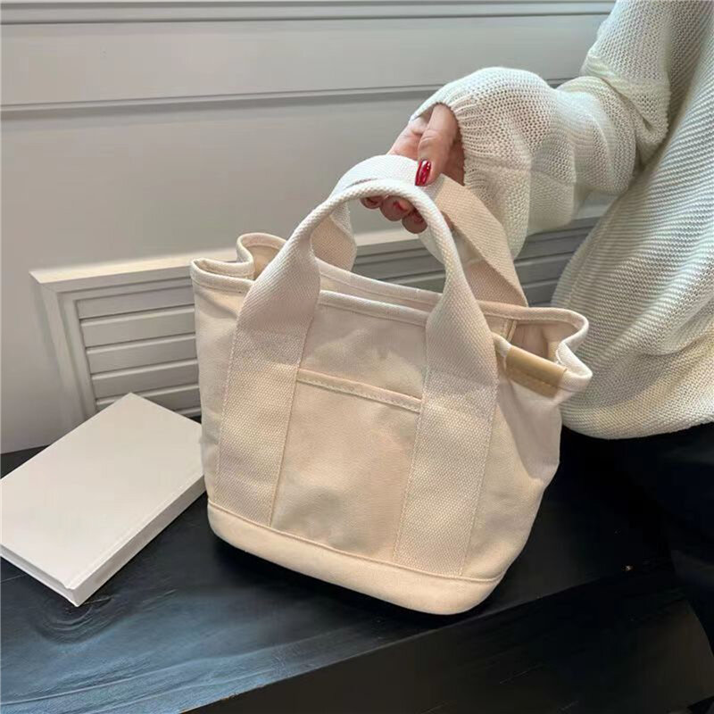 กระเป๋า tas Jinjing kanvas แบบเรียบง่ายทันสมัยสำหรับผู้หญิงสีทึบกระเป๋าถือกระเป๋าหนังสือใบใหญ่แบบลำลองสำหรับนักเรียน