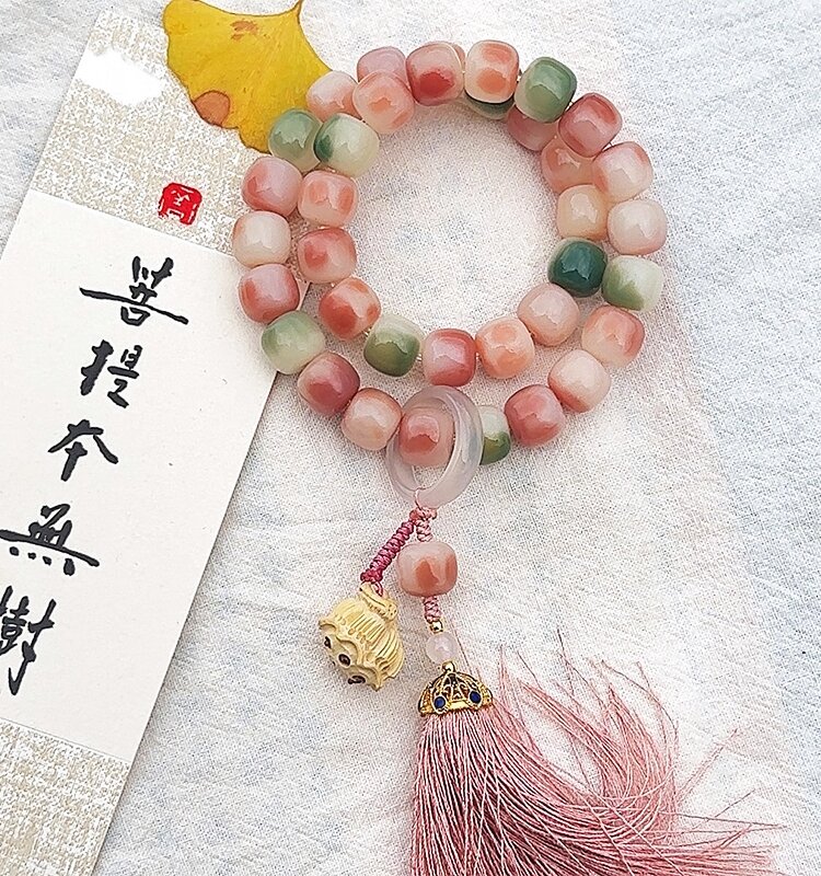 Produk baru gelang akar Bodhi kulit bunga persik pelat pelajar wanita bermain tali tangan Bodhizi genggam Wen bermain manik-manik Buddha
