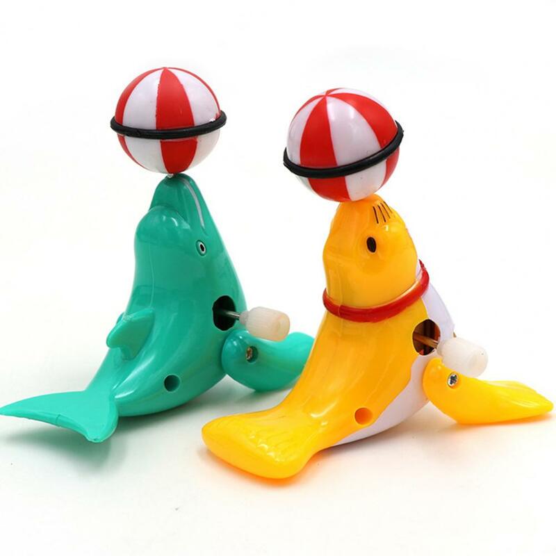 Mainan Angin Lumba-lumba Aman Menarik Anak Laki-laki Perempuan Kartun Hewan Mainan Angin-up Indah Mainan Jam Lumba-lumba Hadiah Pesta