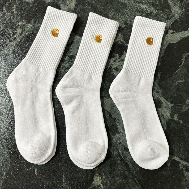 3 pairs of black, white, and gray men's sports socks with simple embroidery style and thickened soles