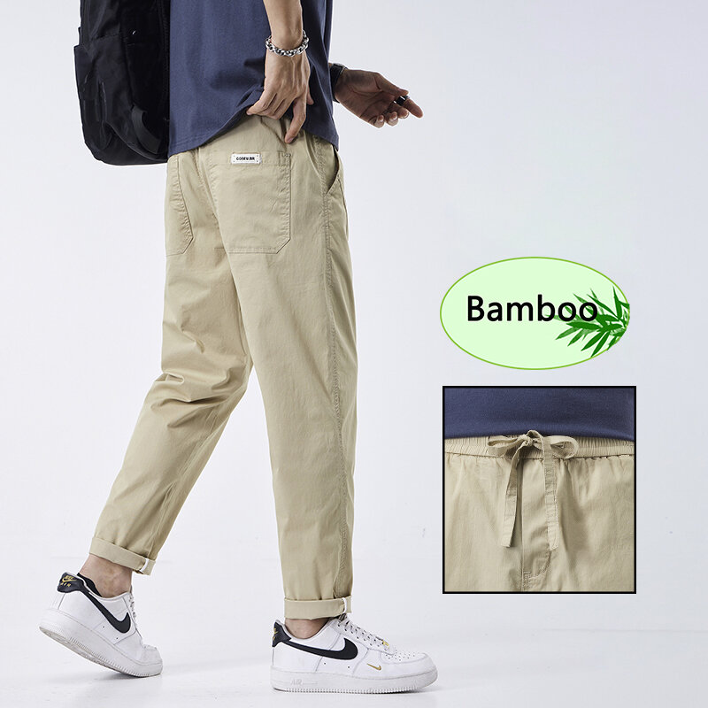 KUBRO estate traspirante tessuto in fibra di bambù pantaloni Casual pantaloni dritti elasticizzati sottili da uomo grigio blu lavoro formale pantaloni da festa da uomo