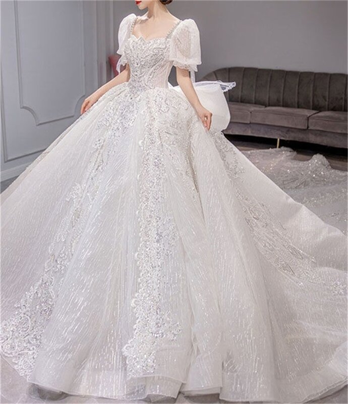 Księżniczka Puffy suknia balowa z rękawami suknia ślubna luksusowe kryształowe cekiny suknie ślubne z perłami sąd pociąg kościół Robe De Mariée
