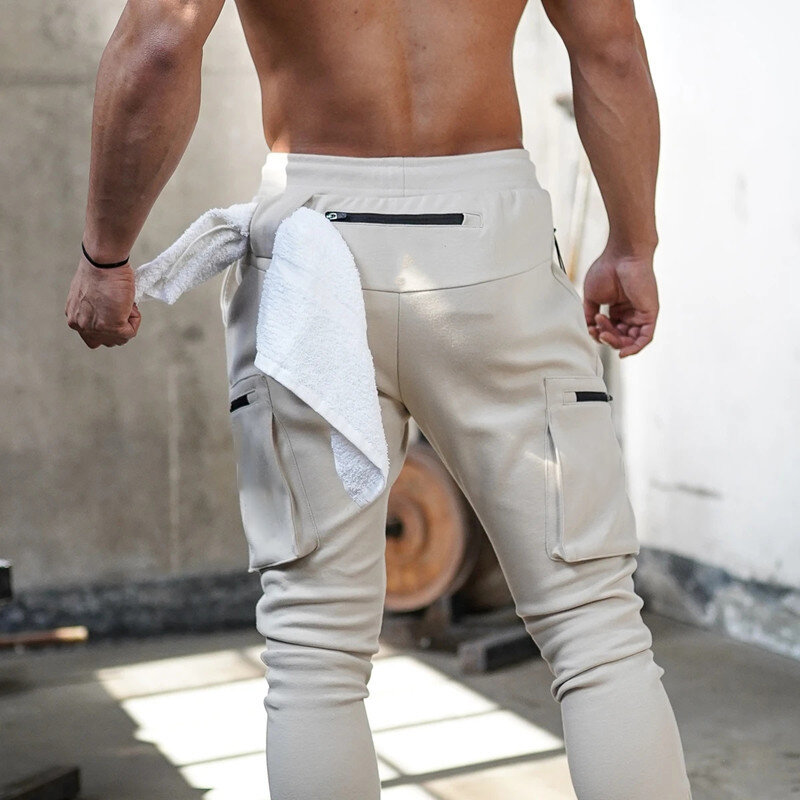 Calça masculina de treino fitness com algodão multifuncional, macacão de bolso com zíper, moda casual