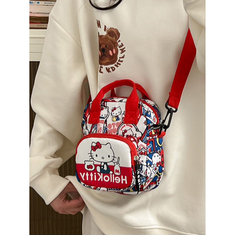 Sanrio Hello Kitty damska torba na ramię Cartoon Cute KT drukowana duża pojemność płócienna torba Crossbody dla dzieci torba podróżna