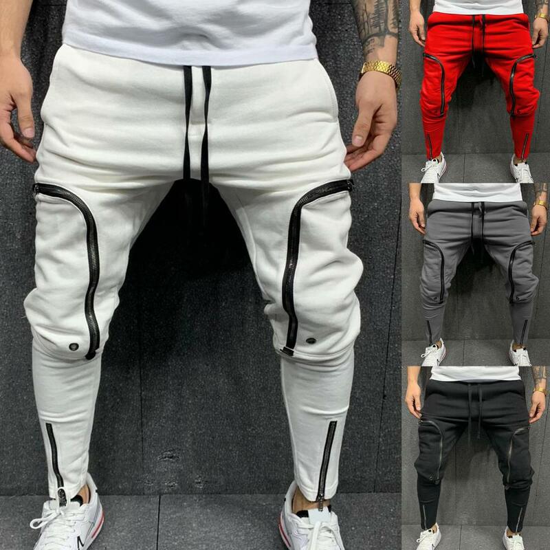 男性用の伸縮性のあるウエストバンド付きのソフトジッパー付きのスポーティなジョギングパンツ,ランニング用のポケット付きのマルチジッパーパンツ