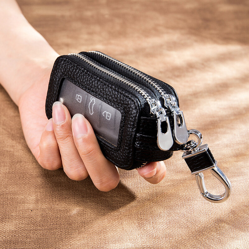 LLavero de cuero genuino para hombre y mujer, bolsa organizadora de llaves de coche, Mini funda portátil para llaves