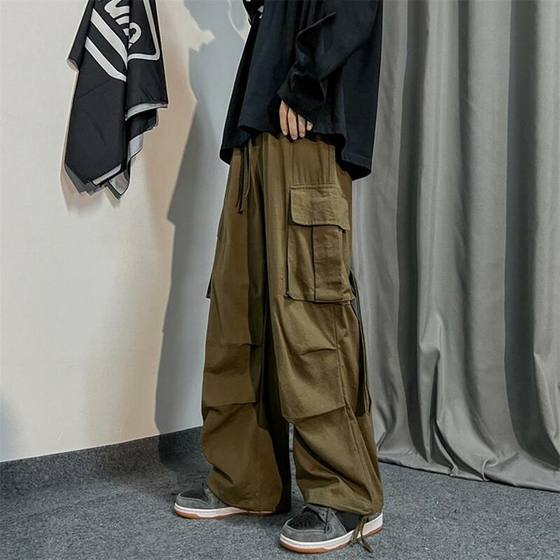 Брюки-карго мужские с большими карманами, однотонные повседневные Прямые Штаны с широкими штанинами, брюки-карго с эластичным поясом
