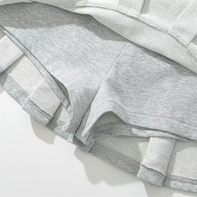 KEYANKETIAN-minifalda de cintura baja para mujer, tela de rizo, plisado ancho, decoración, color gris claro, línea A, Skort, caliente y dulce, nuevo