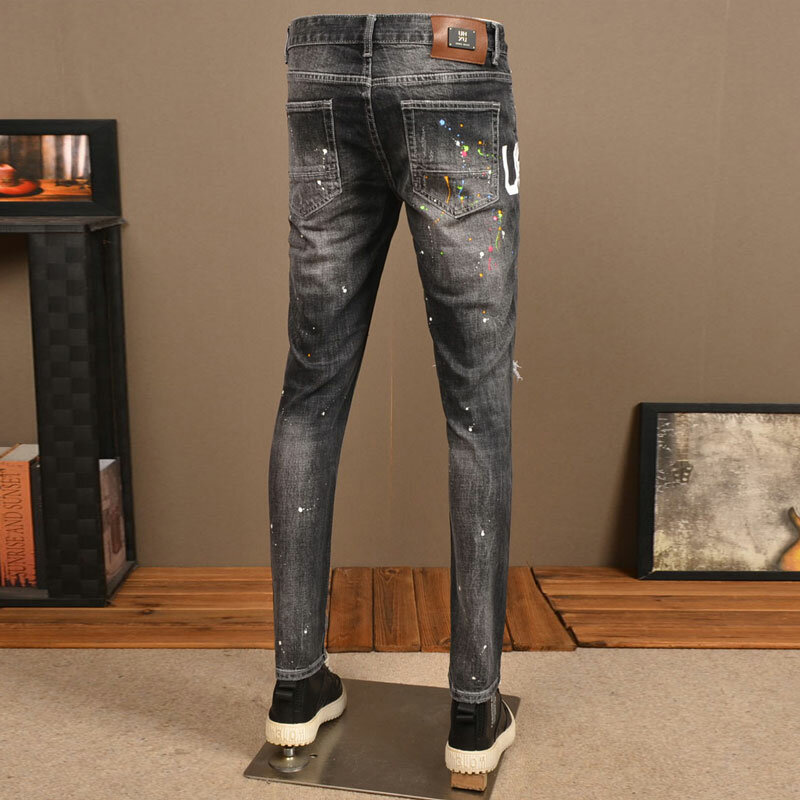 Celana Jeans pria mode jalan Retro hitam abu-abu melar Slim Fit cetak Jeans robek pria dilukis desainer Hip Hop celana Denim Hombre