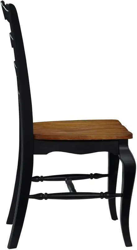 Par de sillas de comedor de roble francés y negro, asiento contorneado de roble desgastado, acabado negro frotado y diseño de pata francesa