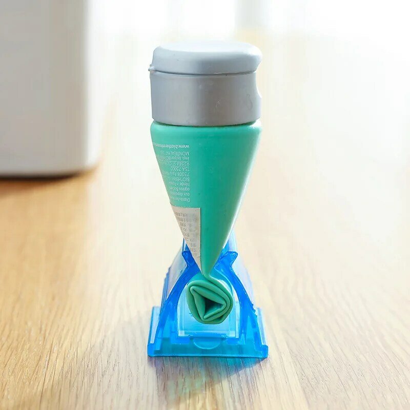 Novo 4 cores casa de plástico creme dental tubo squeezer titular rolamento fácil dispenser banheiro fornecimento acessórios limpeza dente