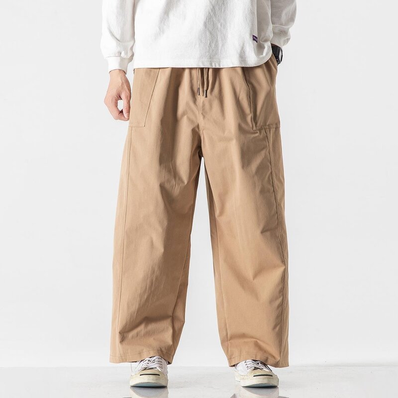 Nowe letnie męskie spodnie haremowe jednolita elastyczna talia Hip Hop spodnie do kostek mężczyzn luźne codzienne spodnie ściągane sznurkiem męskie Streetwear