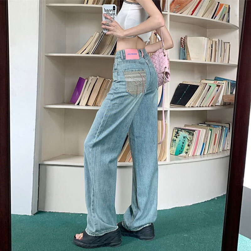 กางเกงผู้หญิงเอวสูงตรงขากว้างปักลายมีกระเป๋ากางเกงยีนส์ไซส์ใหญ่พู่ห้อยทรงลูกแพร์