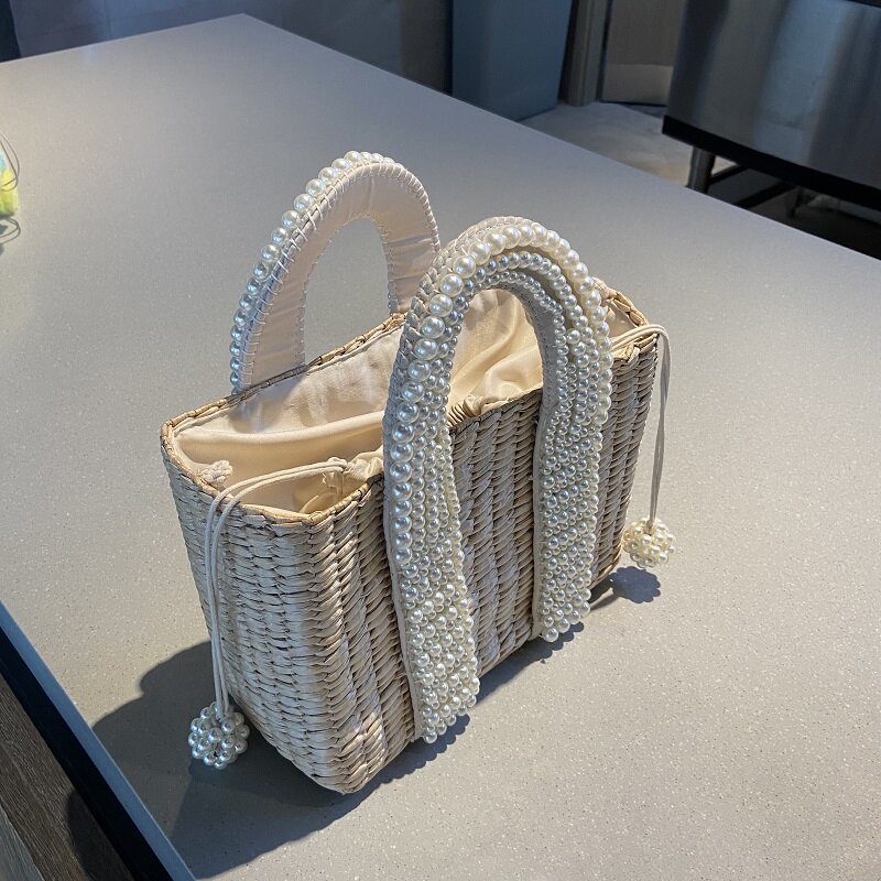 Borsa da spiaggia estiva in paglia cestini di grandi dimensioni Design perline borse a tracolla intrecciate in vimini perle di moda di lusso borse da donna in Rattan