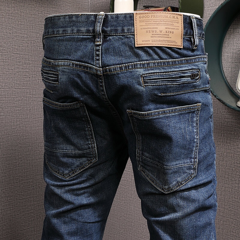 بنطلون جينز رجالي بتصميم عتيق من Streetwear نمط فاشيون بنطلون جينز بتصميم ممزق نمط هيب هوب مزود بسحّاب