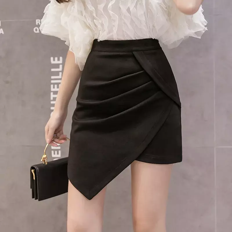 Minifalda ceñida a la cadera para mujer, falda Sexy de cintura alta con pliegues elegantes, color negro, primavera y verano, 2024
