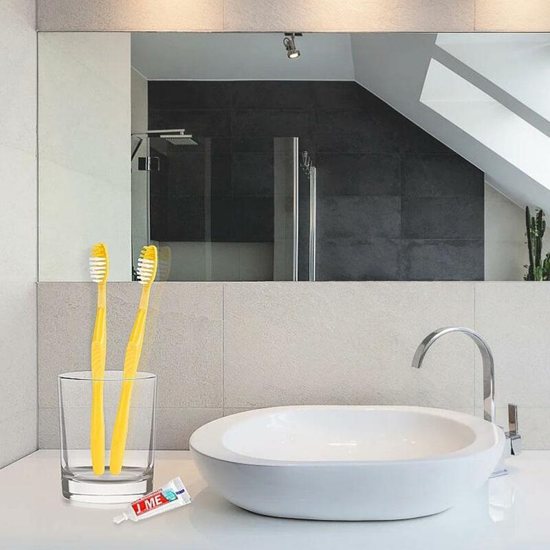 Cepillo de dientes desechable con Kit de pasta dental, cepillo de dientes portátil de viaje para Hotel, producto para el cuidado bucal, 10-100 piezas